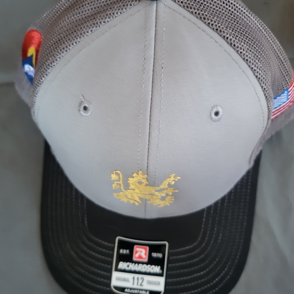 Richardson Gray and Black Cap with Gold Logo.